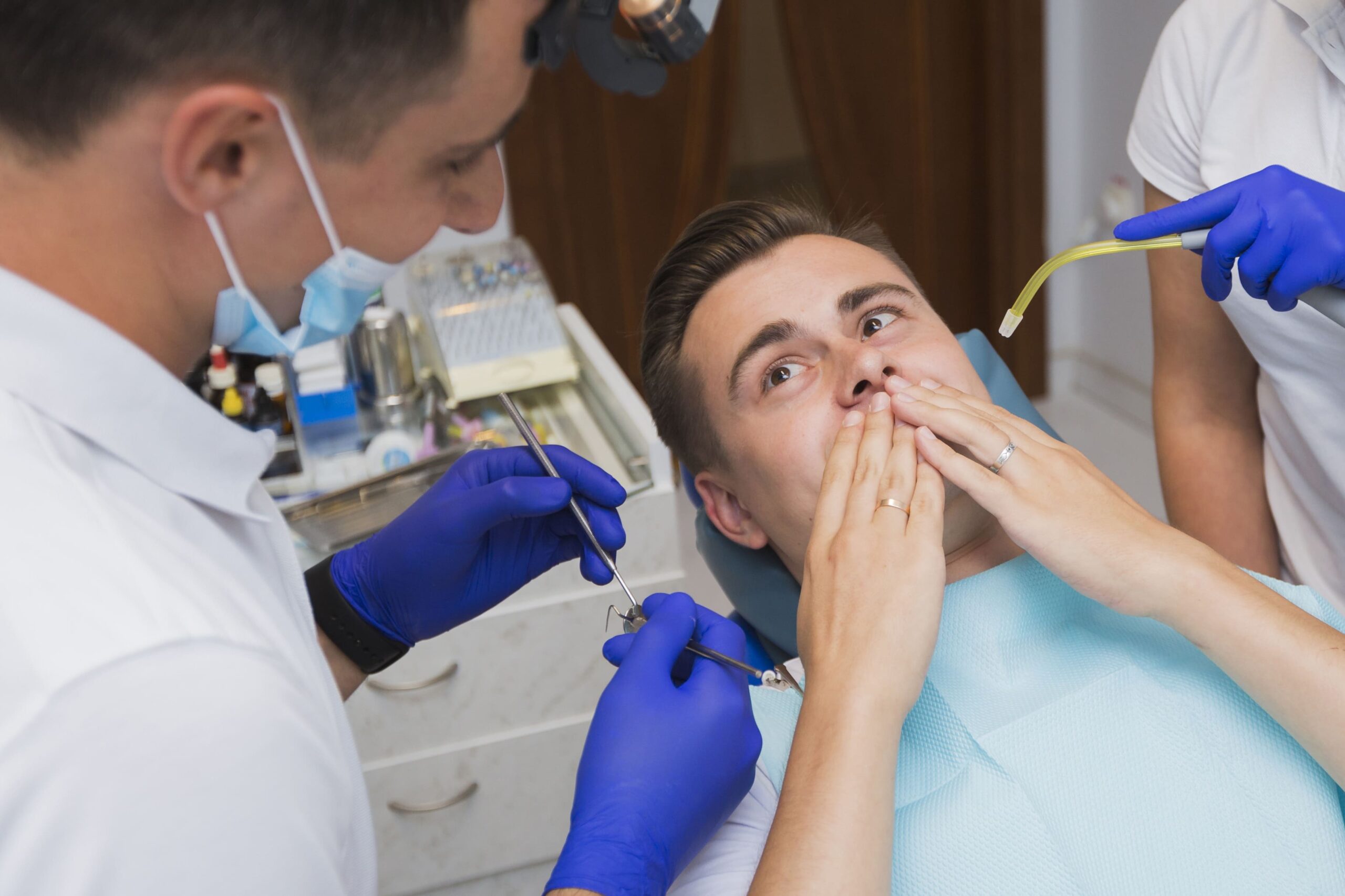 how does a dentist pull teeth